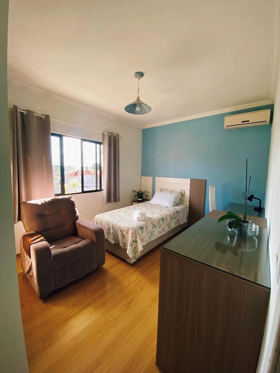 Quarto acolhedor da Casa di Lucy